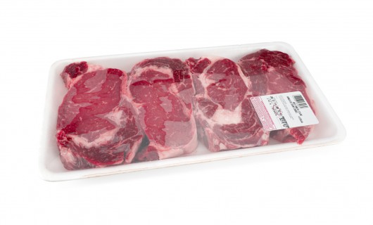 Fresh red meat packed in a poly bag.